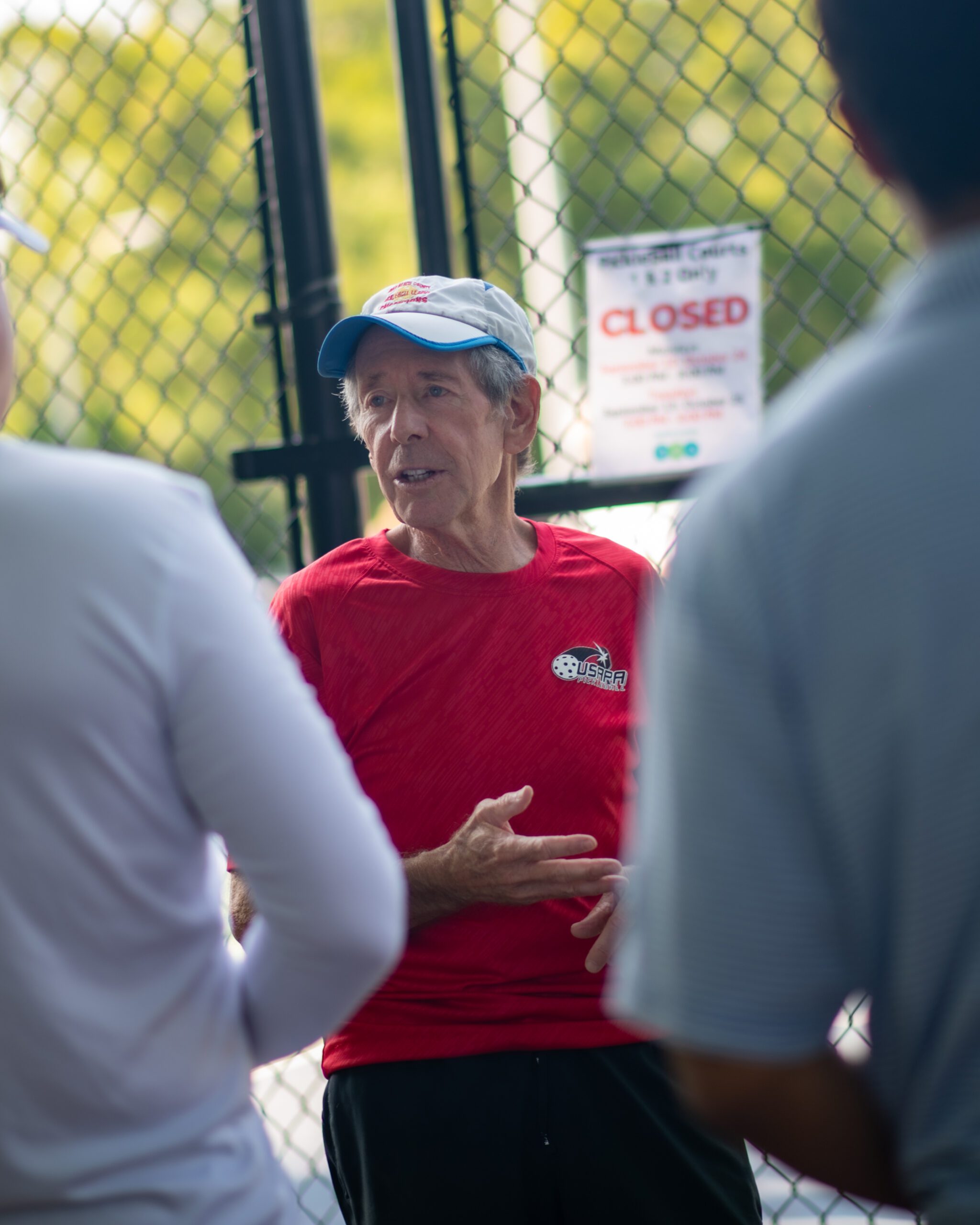 Bob Savar talking about pickleball with his students